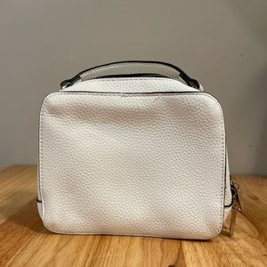 Small, white with black trim, crossbody bag from Mango Spain. Never used.